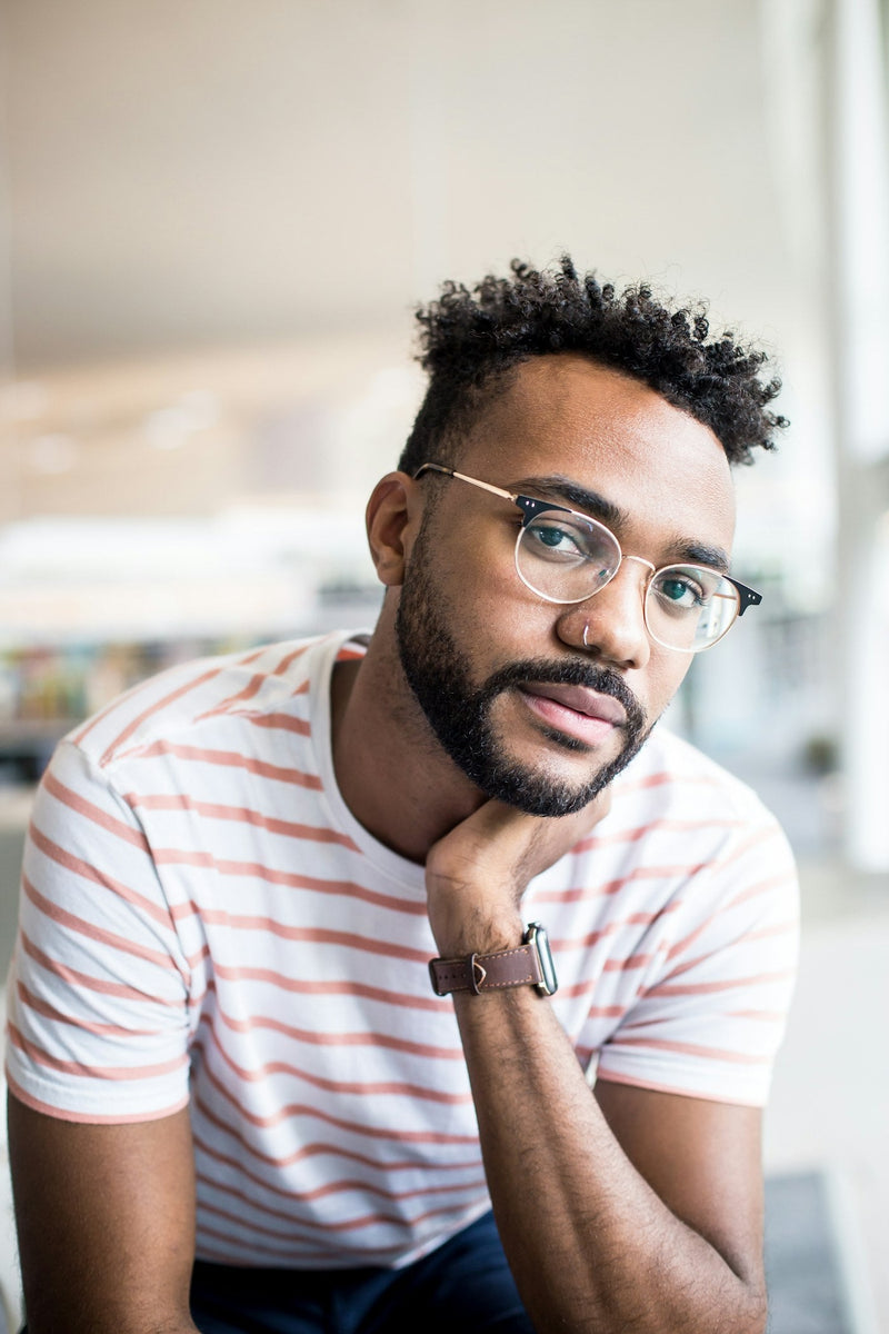 How to apply beard oil — confident man with a maintained beard after daily care