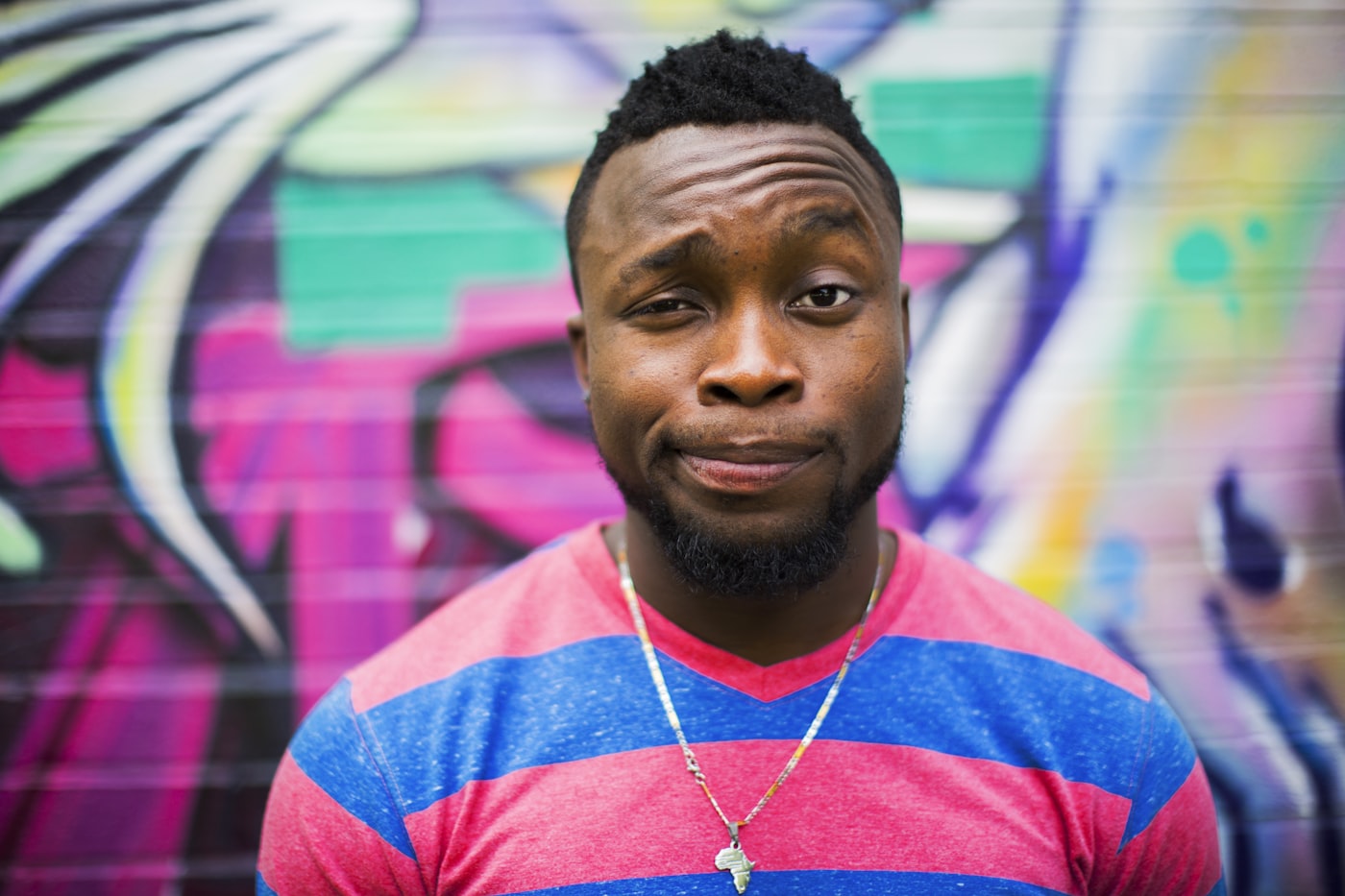 Man with a well-groomed short beard in an urban lifestyle setting
