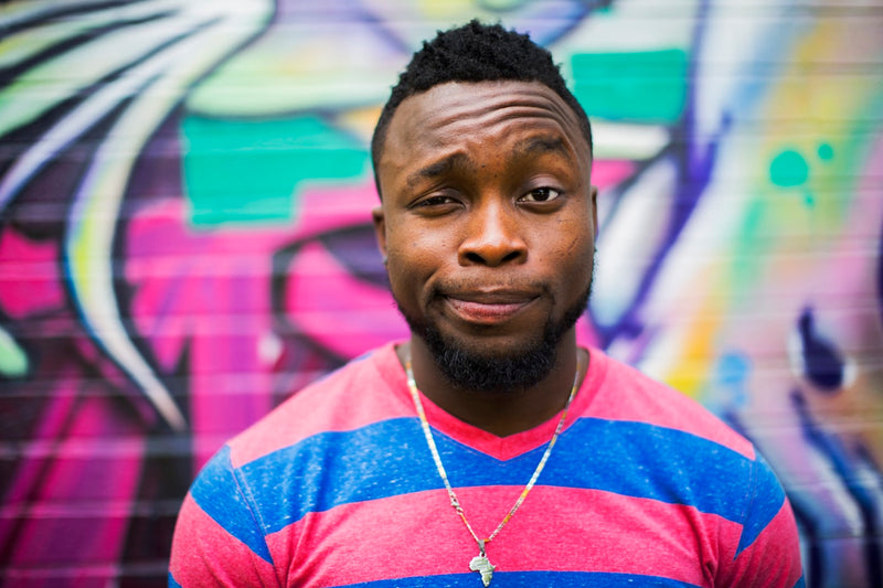 Man with a well-groomed short beard in an urban lifestyle setting